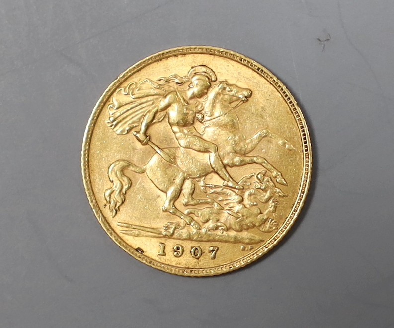 An Edward VII 1907 gold half sovereign.